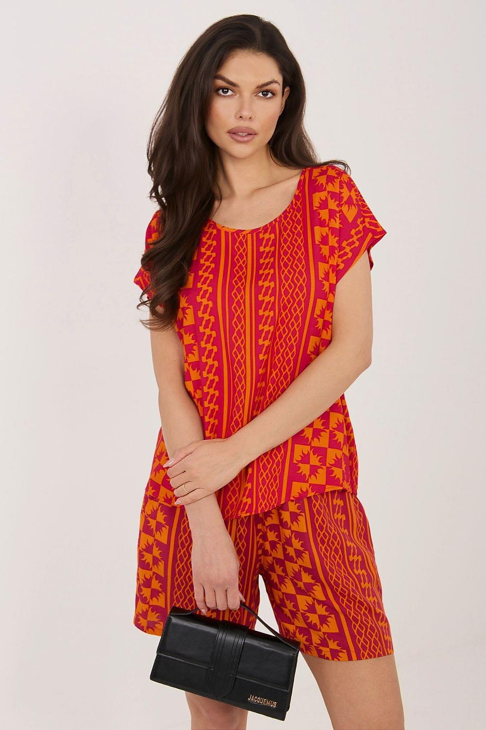Orange printed blouse with short sleeves and round neckline, front view with handbag
