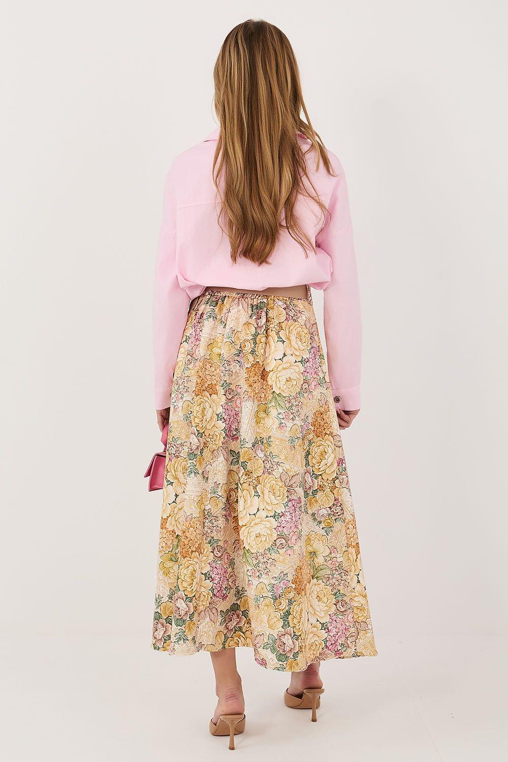Floral midi skirt with yellow base and pink, green floral print, back view