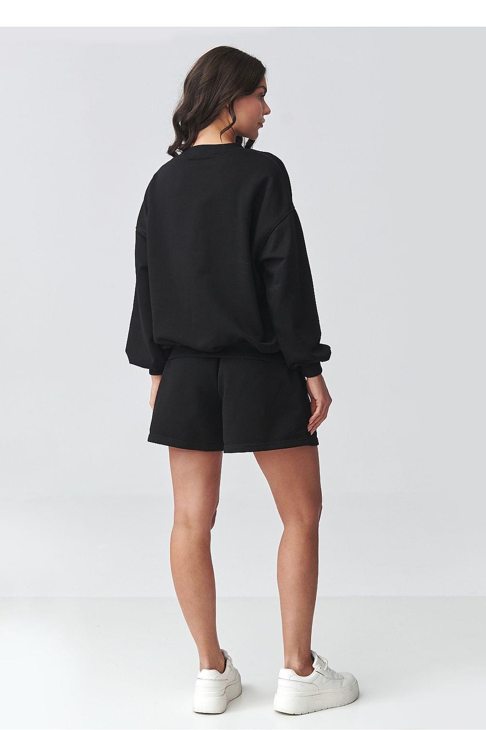 Black sweatshirt and shorts set, back view with crewneck top and elastic waist shorts