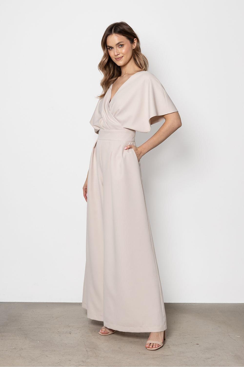 Long V-neck maxi jumpsuit, light beige, side view with cape sleeves and tie waist