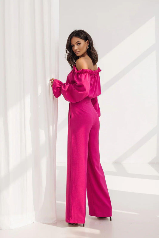 LaBalancia off-shoulder blouse and wide-leg pants set in hot pink, long sleeve cuffs