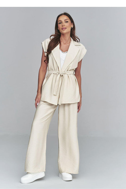 Beige sleeveless tie-front vest with matching wide-leg pants, two-piece outfit