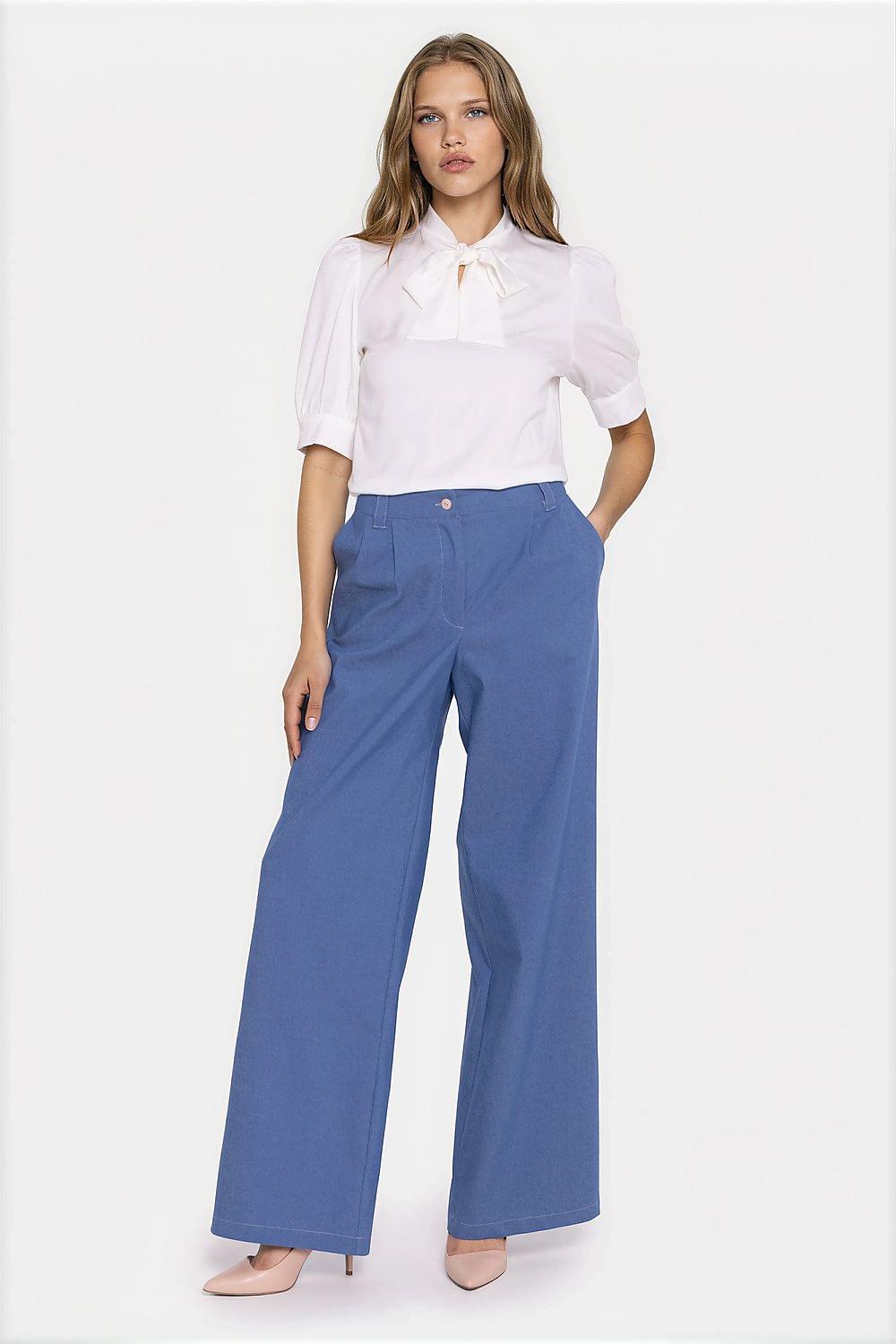 Blue wide-leg jeans with button waistband and relaxed wide leg silhouette