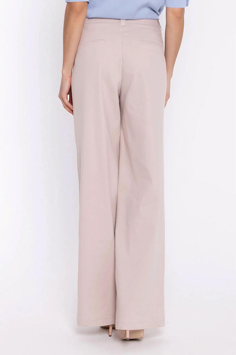 Beige wide-leg jeans with front pleats and relaxed straight legs