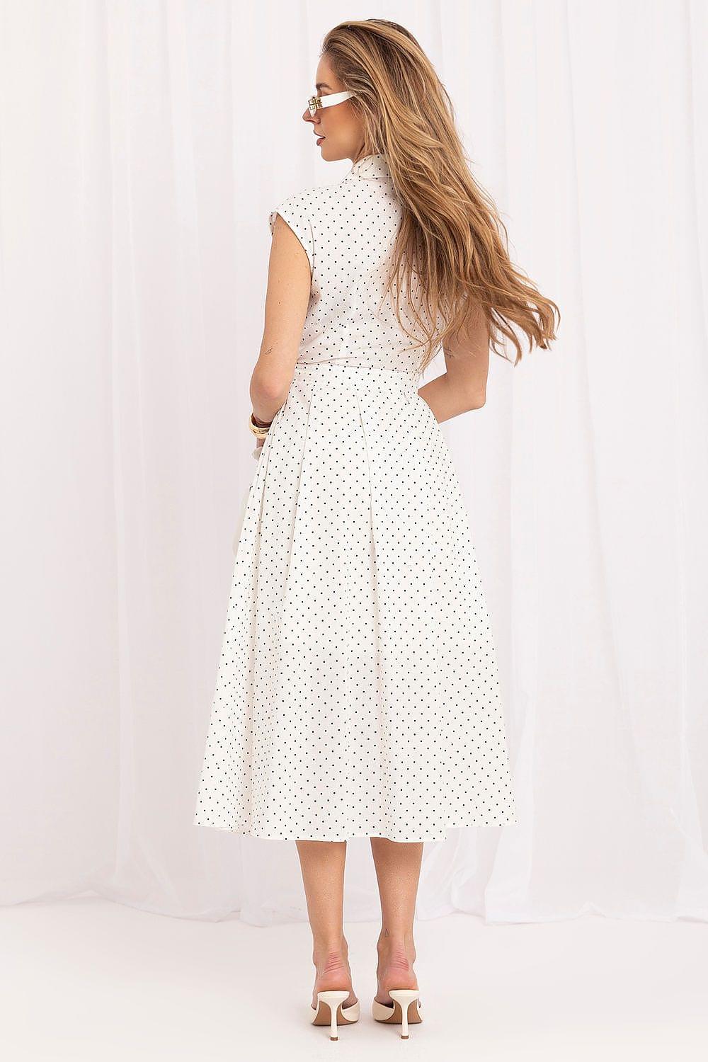 White sleeveless day dress with collar and small dotted print, knee-length flared skirt