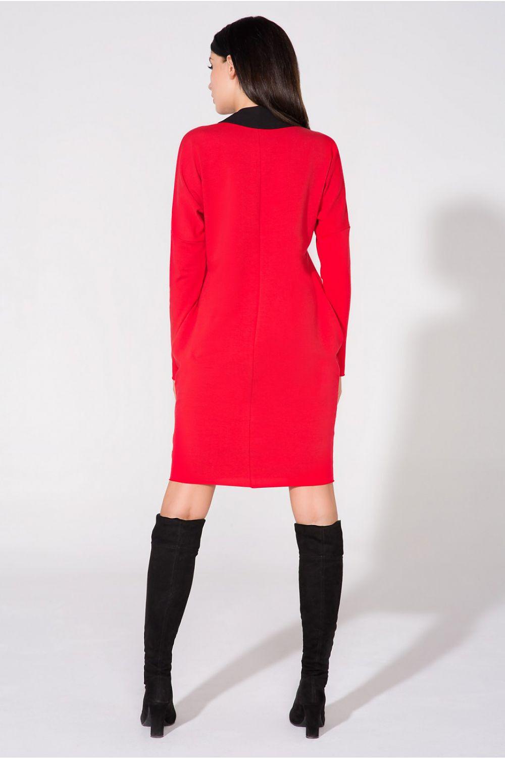 Tessita evening dress back view in red with black collar and long sleeves.