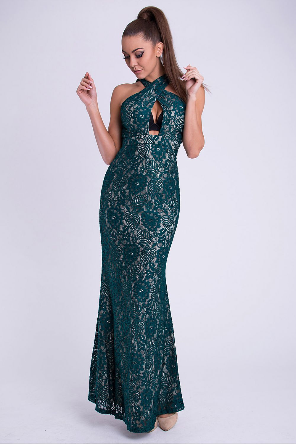Green lace sleeveless maxi dress with high neck and fitted mermaid silhouette