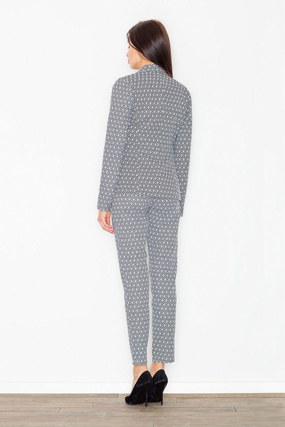 High-waisted geometric print trousers, gray and white repeating pattern, back view