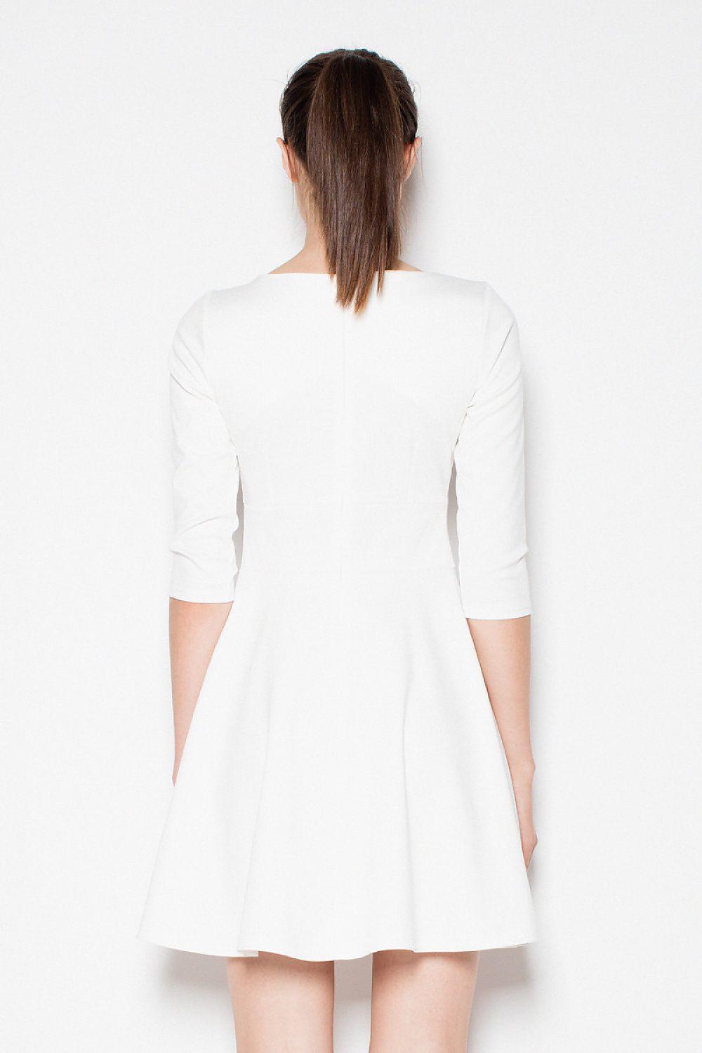 White daydress back view with 3/4 sleeves, center back seam, and flared skirt