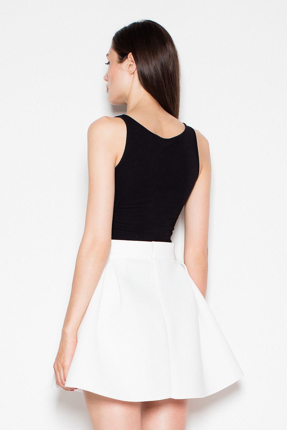 White flare skirt with fitted waistband and pleated back, above-knee length