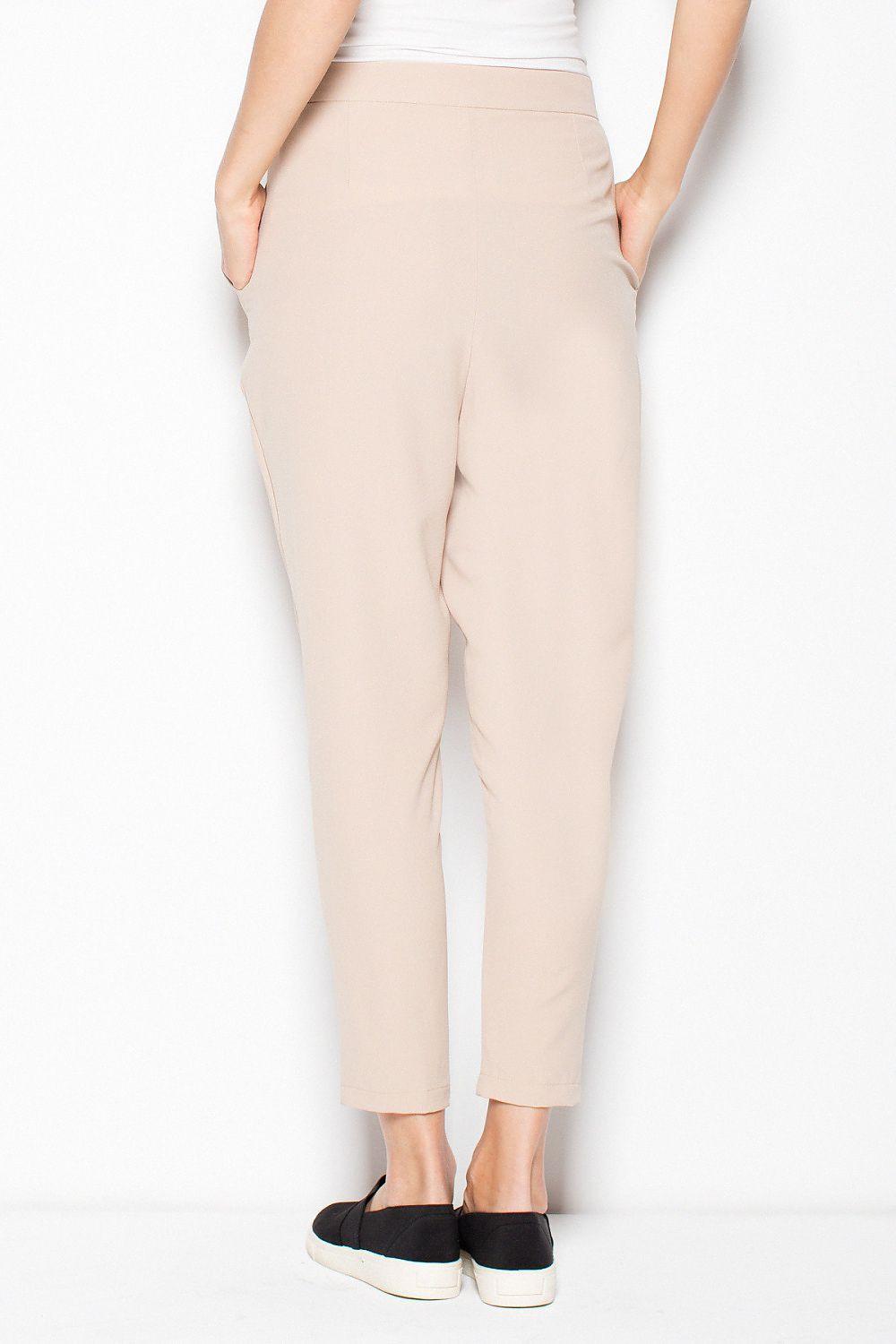 Beige women's ankle trousers with center seam and tapered leg