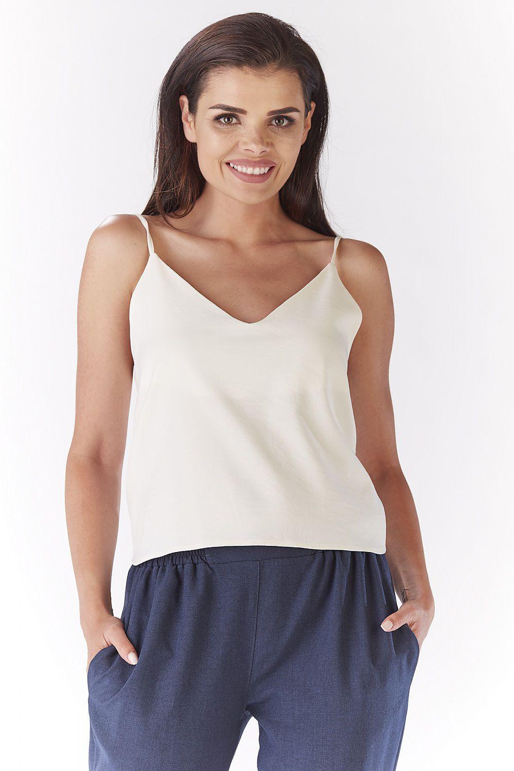 Sleeveless V-neck blouse, light color, flowy fit