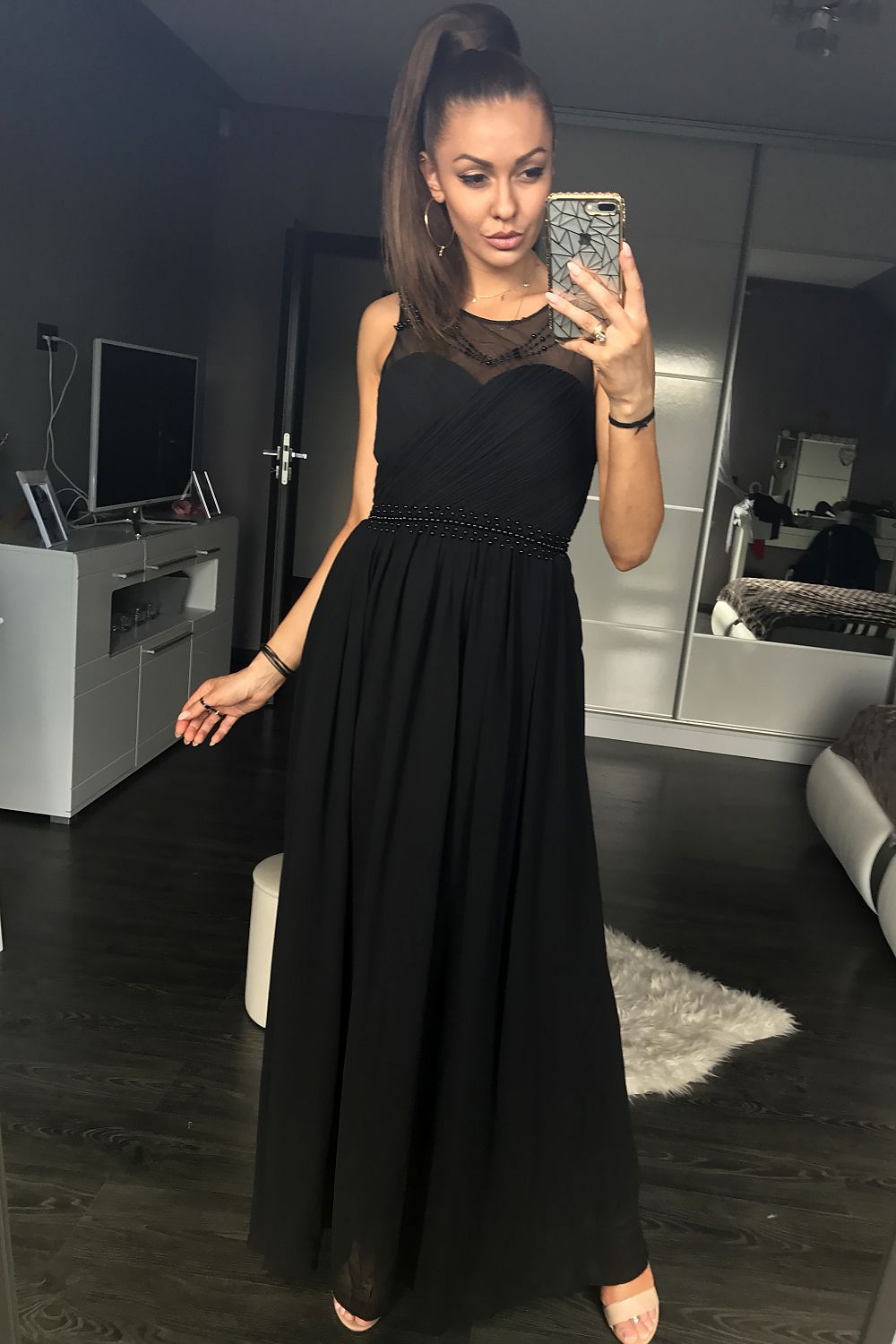 Black maxi dress with beaded mesh corset bodice and flared skirt, sleeveless