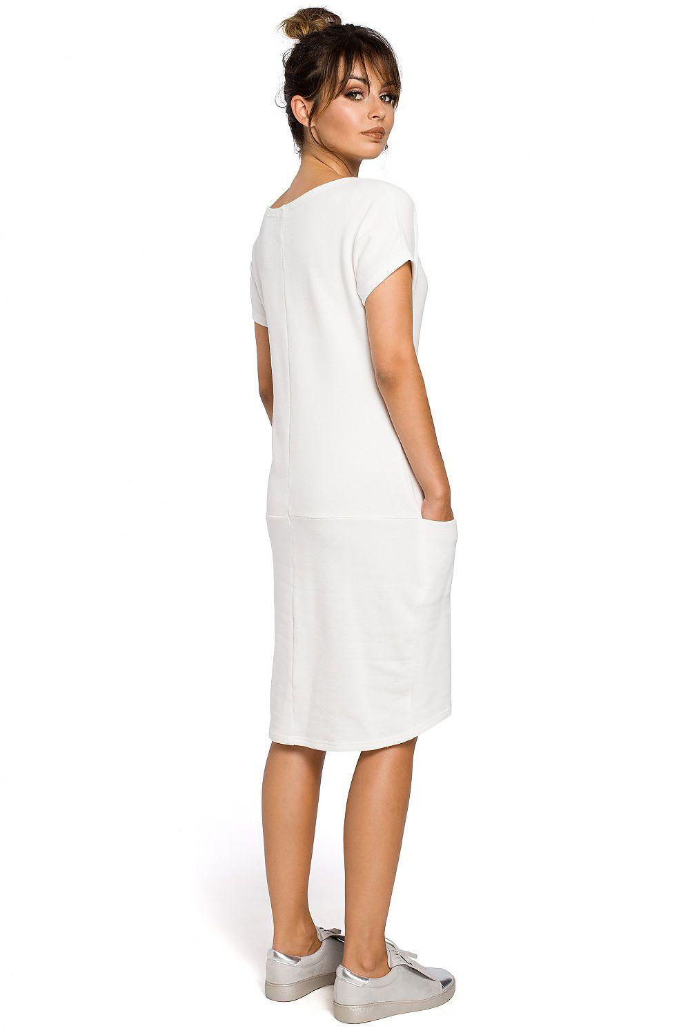 White daydress back view with short sleeves and knee-length straight silhouette.