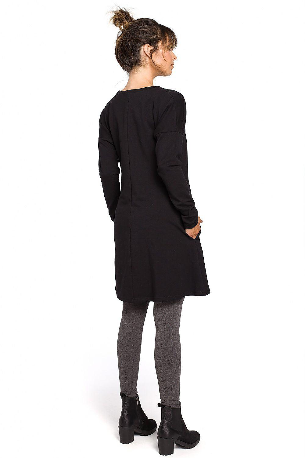 BeWear black tunic back view with long sleeves and front slit hem