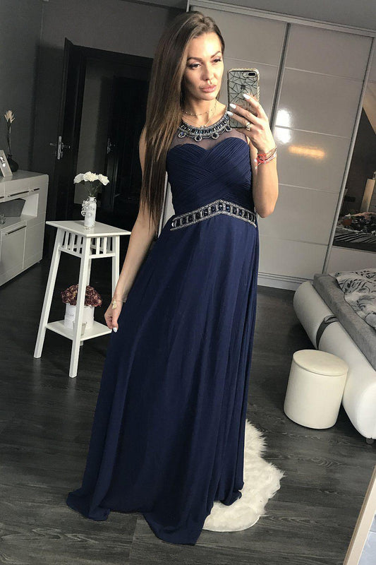 Navy blue sleeveless maxi dress with beaded neckline and fitted bodice