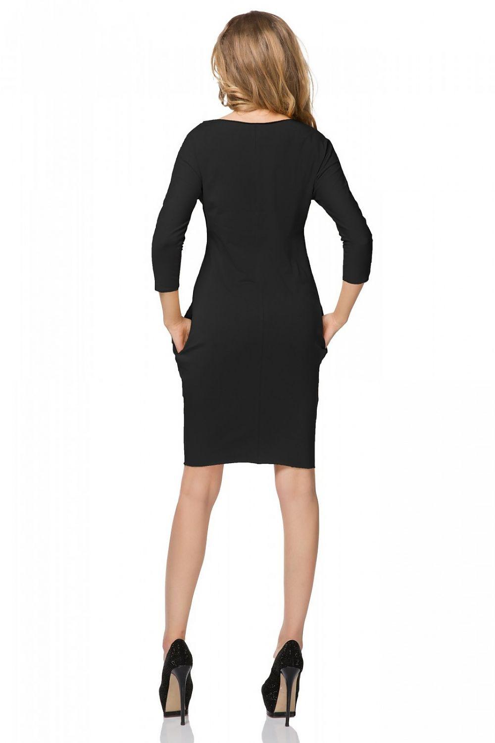 Black daydress back view with 3/4 sleeves and fitted knee-length silhouette