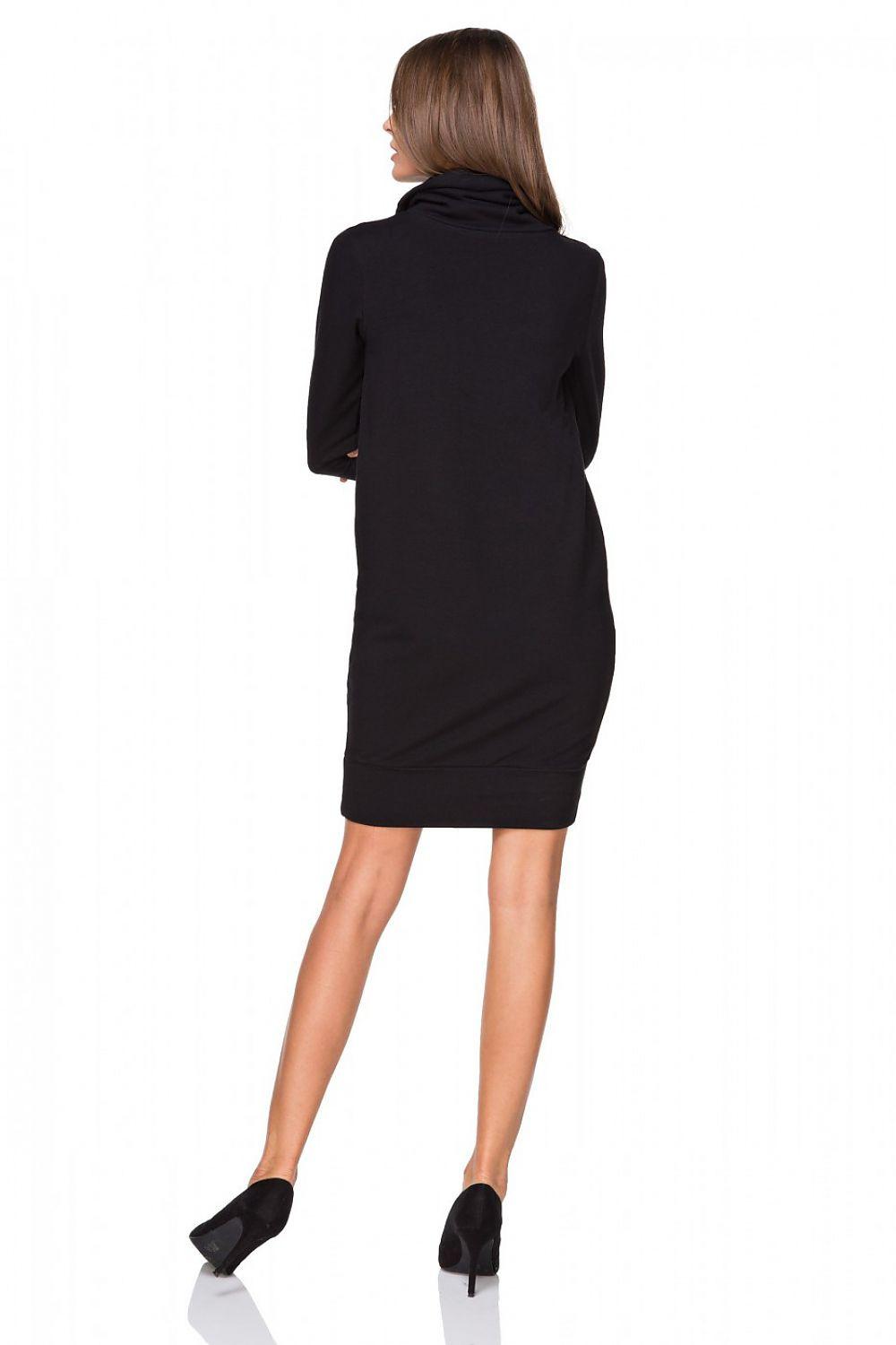 Black daydress back view with cowl neckline and long sleeves, fitted mini length