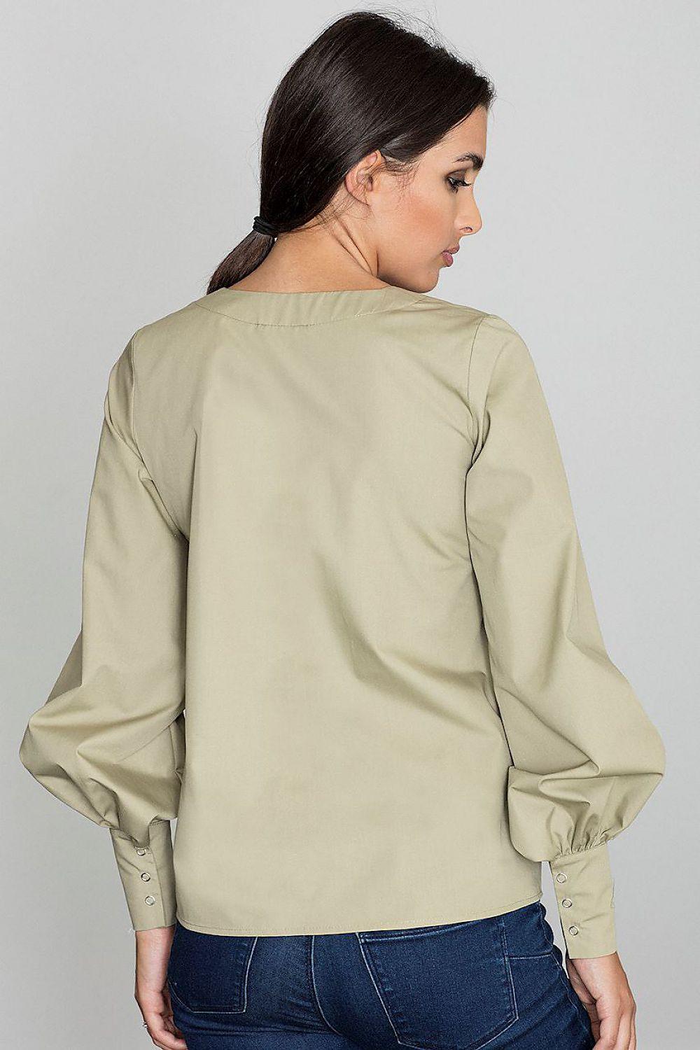 Light green blouse back view with long puff sleeves and elastic cuffs