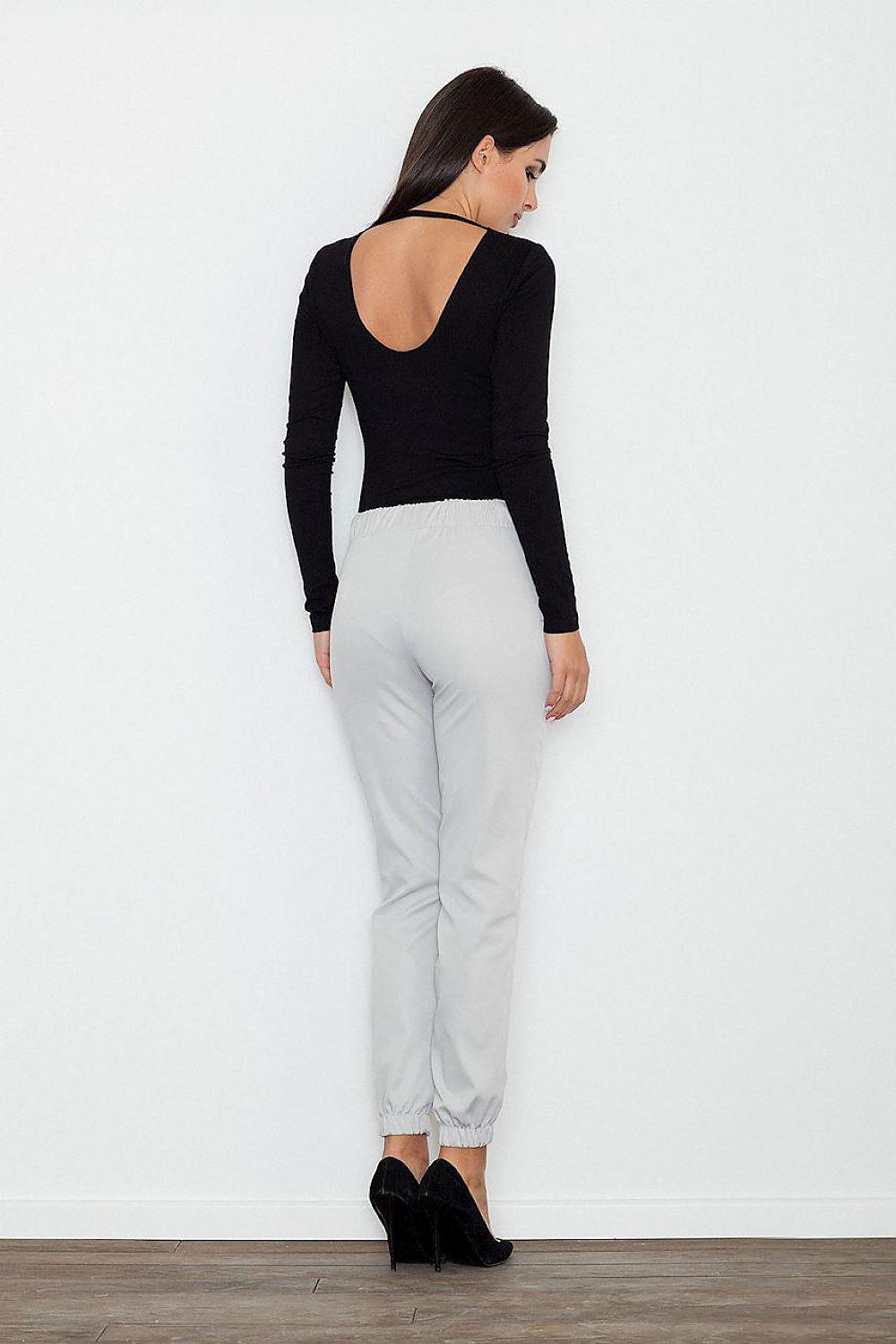 Light grey tapered ankle trousers, back view, cuffed hem