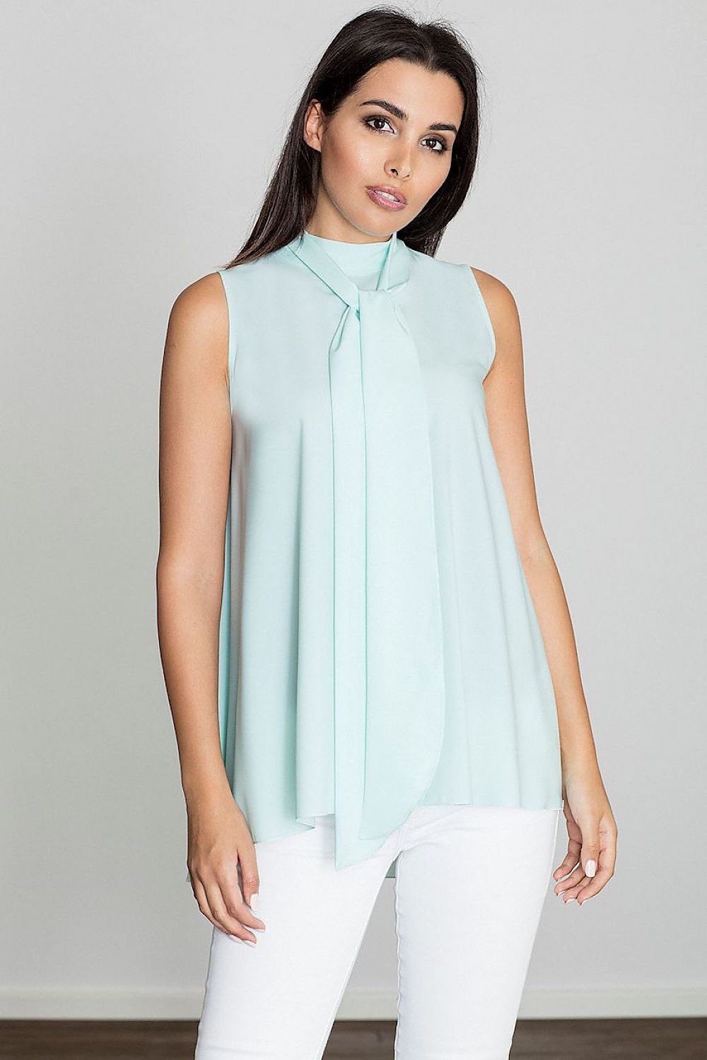 Light teal sleeveless blouse with decorative front tie and high neckline