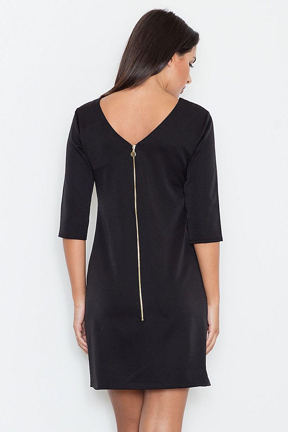 Black daydress with open back and gold chain drop