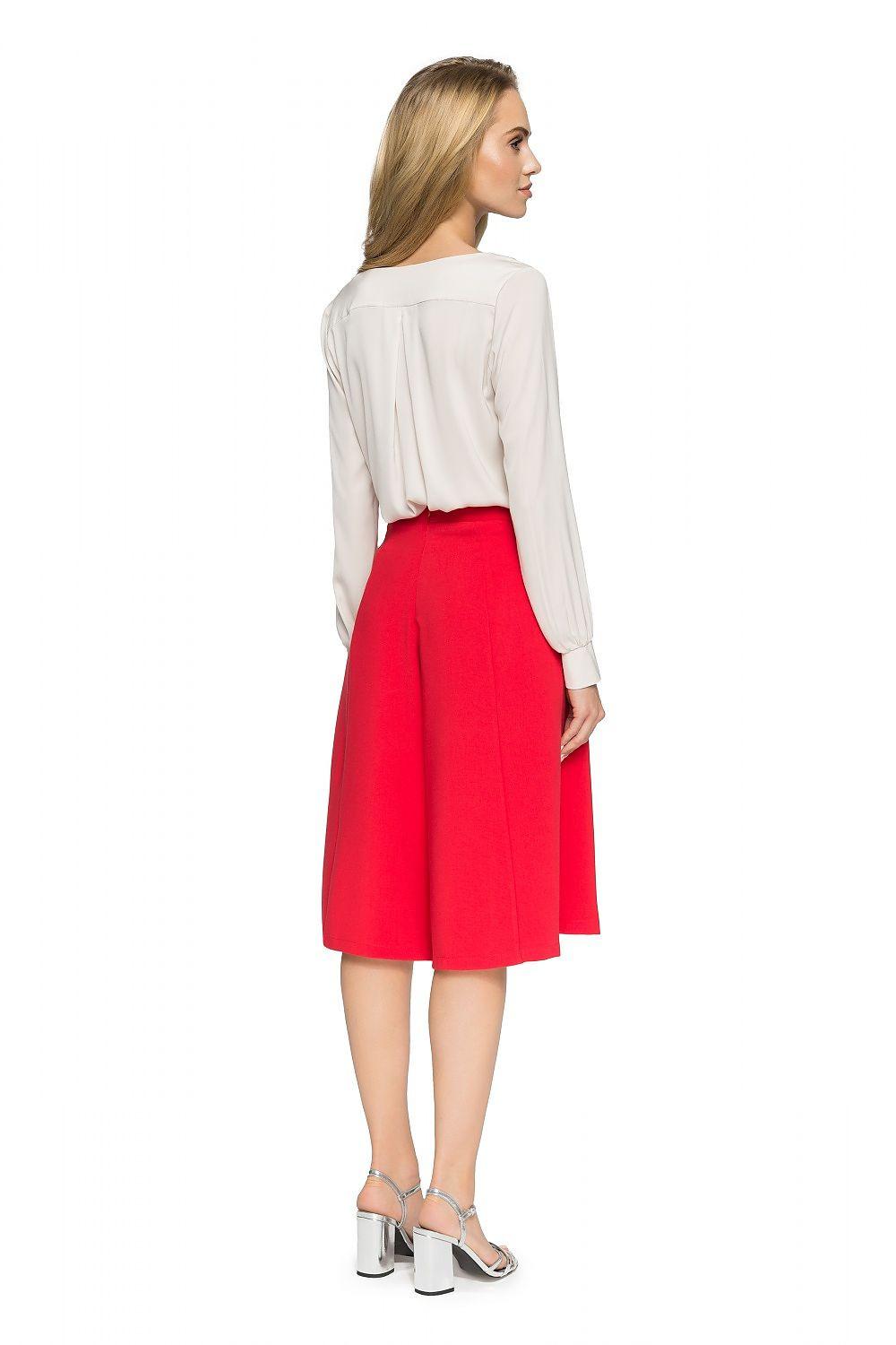 White blouse back view with long sleeves and gathered cuffs