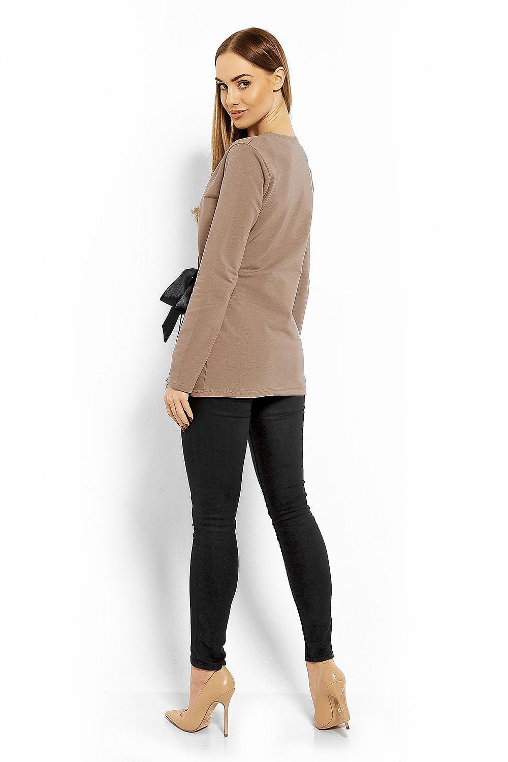 PeeKaBoo beige wrap blouse in profile, V-neck with long sleeves and side tie