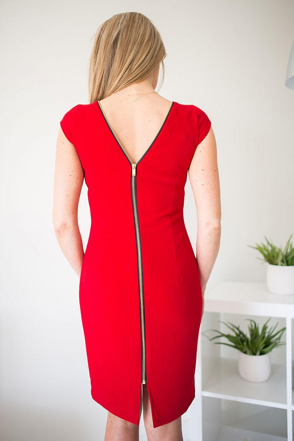Red cocktail dress, open-back style with long zipper trim and back slit hem.