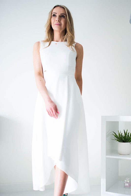White sleeveless cocktail dress with high neckline and asymmetrical midi hem