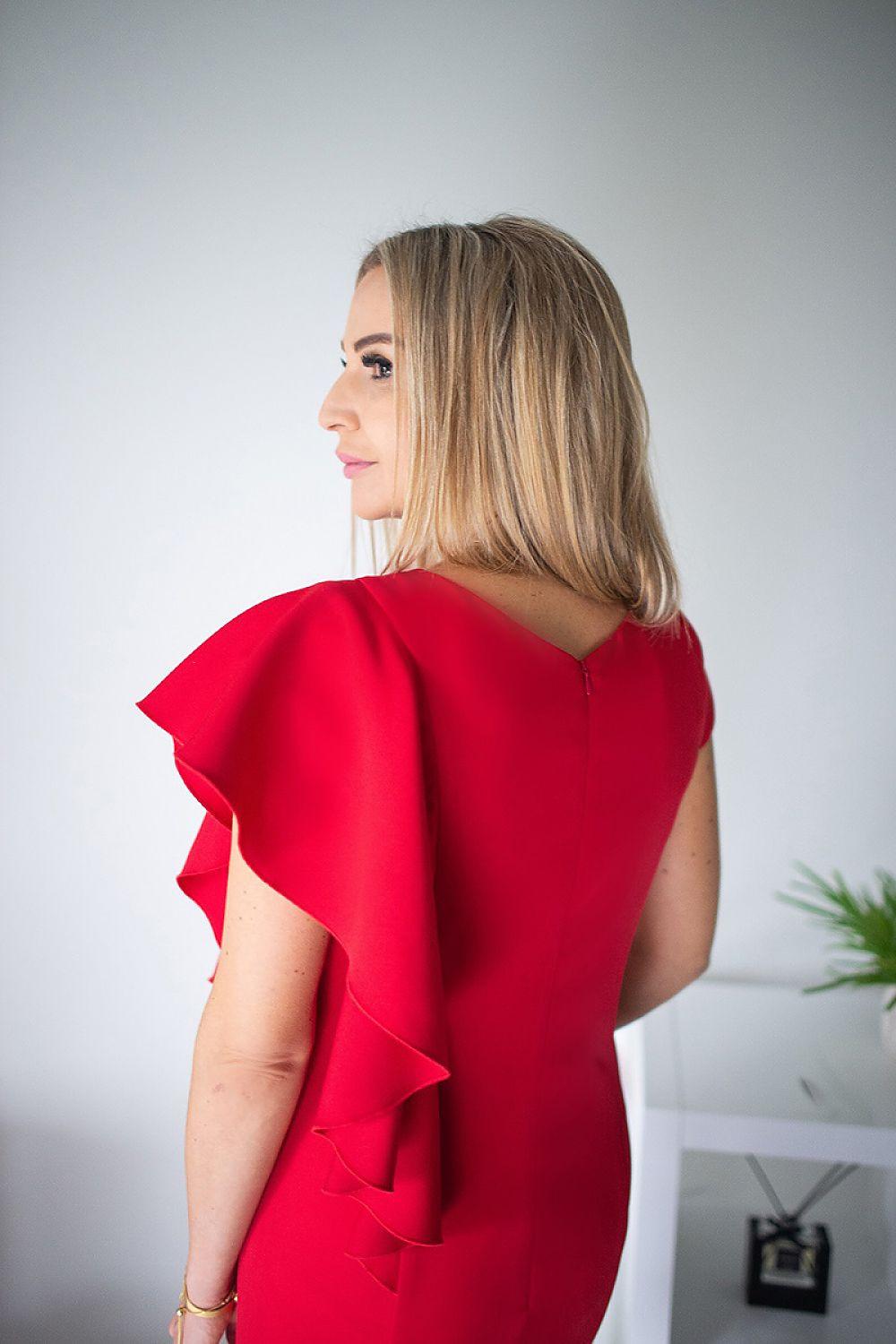 Red cocktail dress with cape-like back ruffle and fitted silhouette