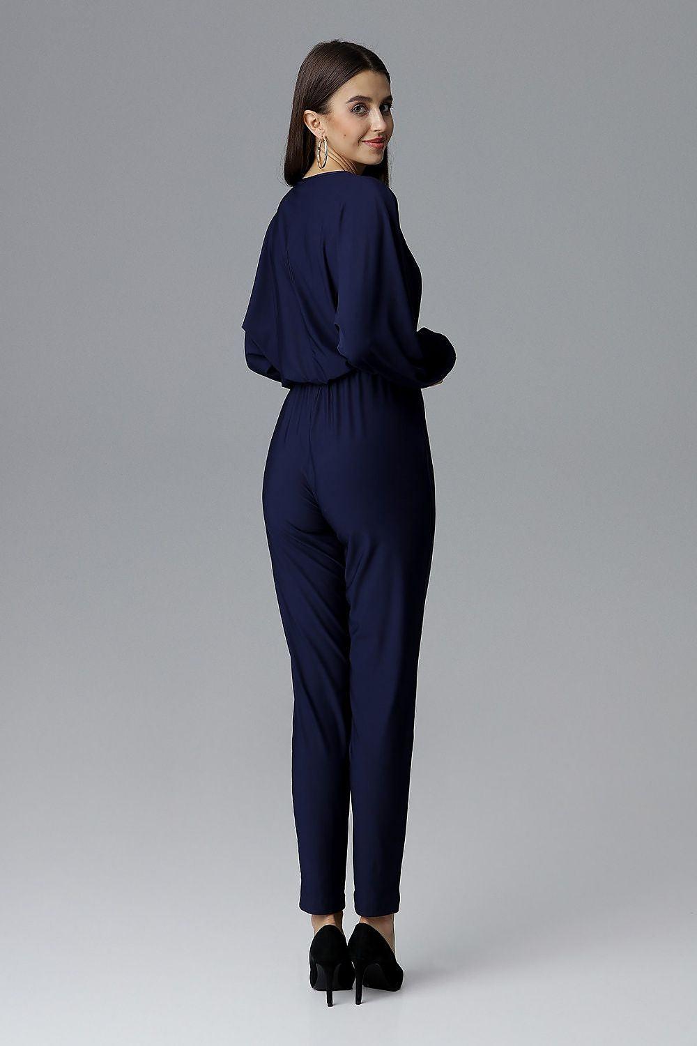 Dark blue wrap jumpsuit, back view, long balloon sleeves, elastic waist, tapered legs