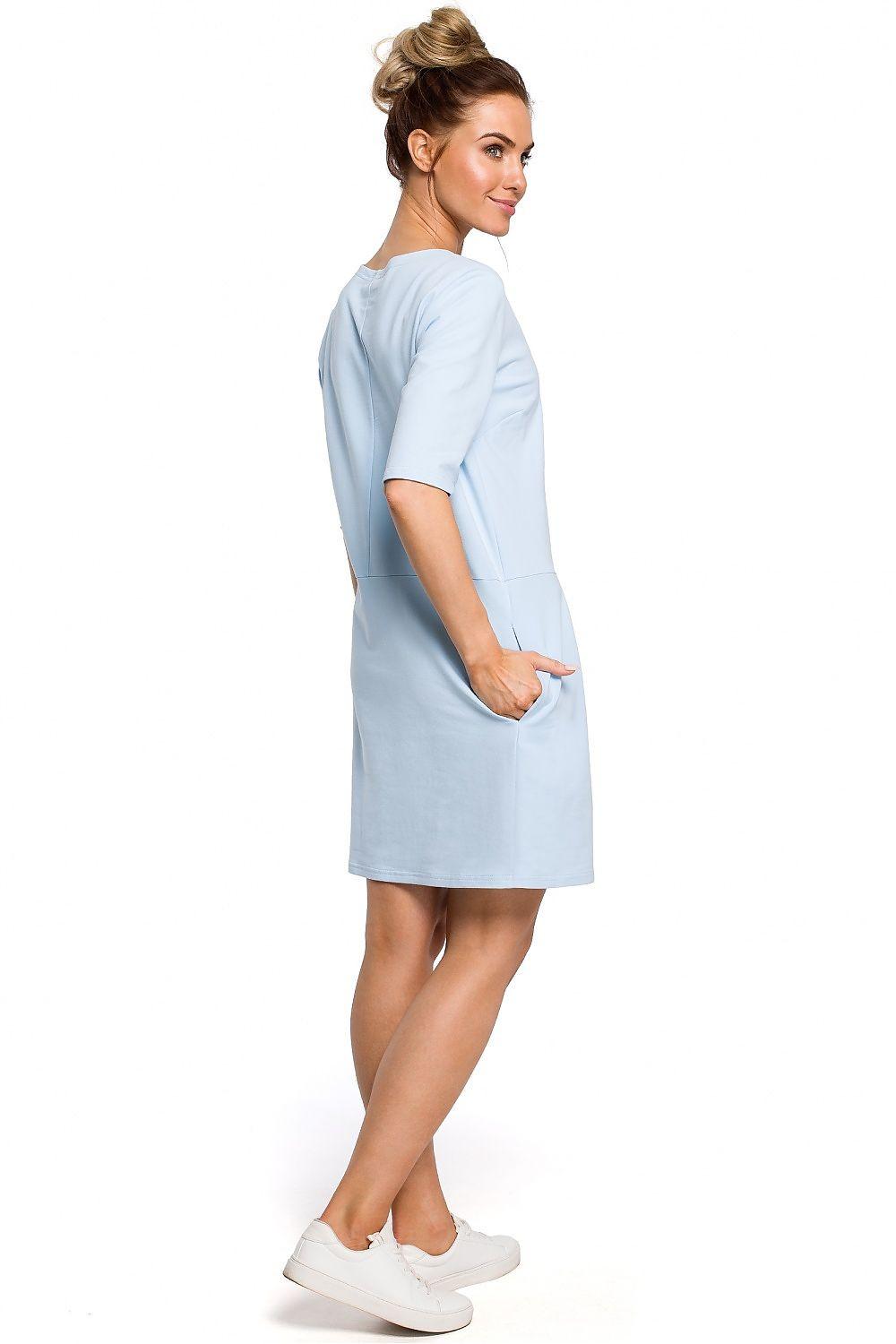 Light blue day dress with round neckline and short sleeves, gathered skirt