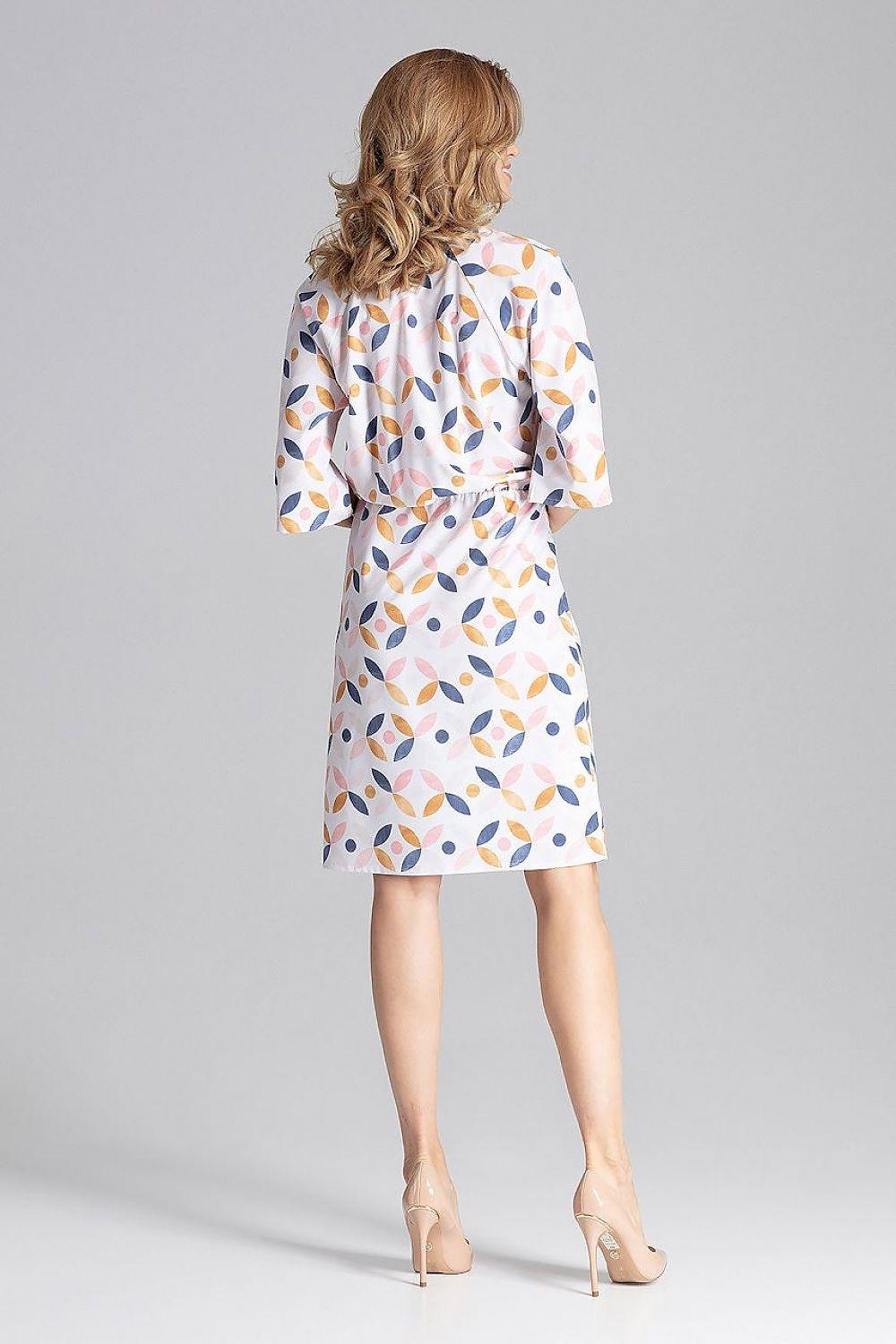 Figl white printed daydress with colorful leaf pattern, back view and waist tie