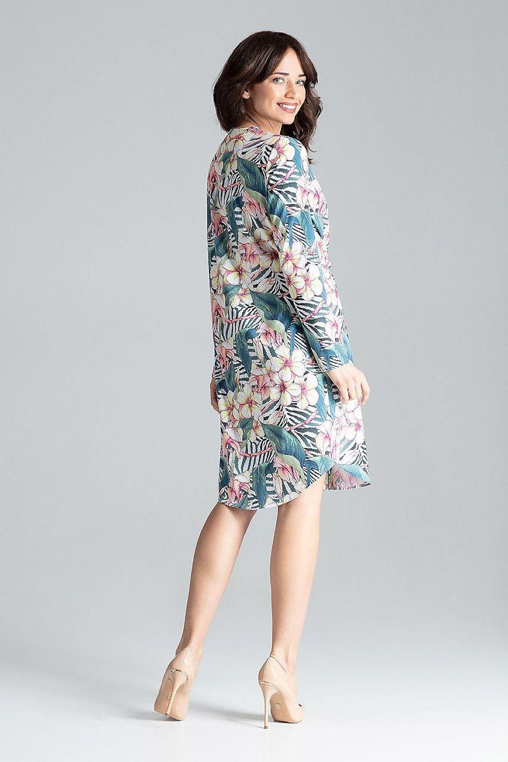 Multicolor floral daydress in side view with V-neck button front and tie waist