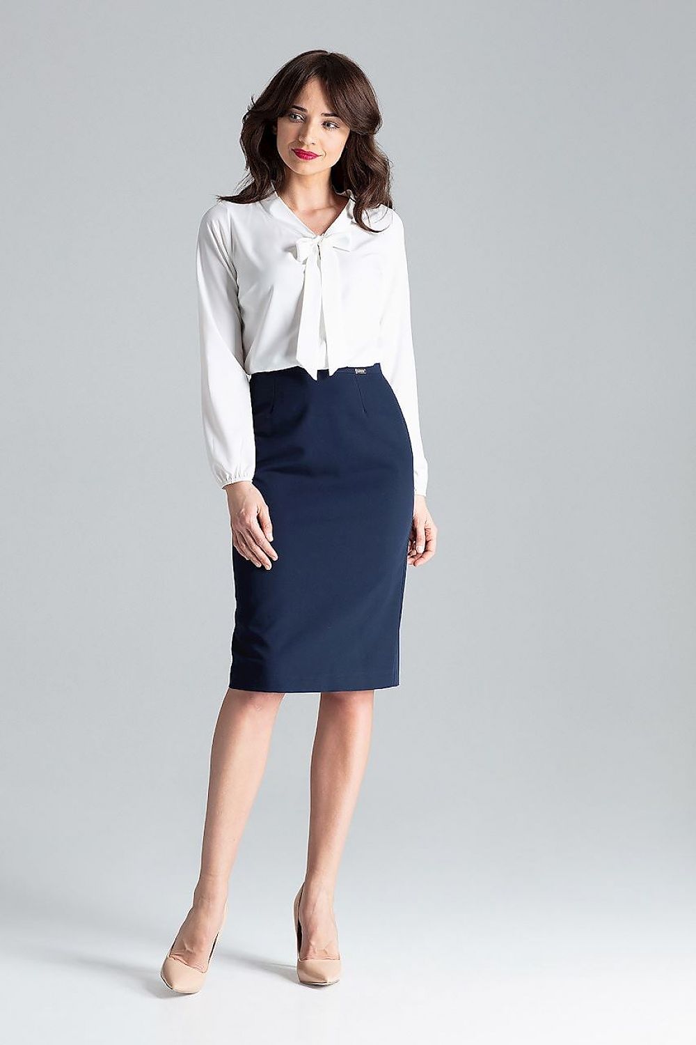White tie-neck blouse with long sleeves and bow collar