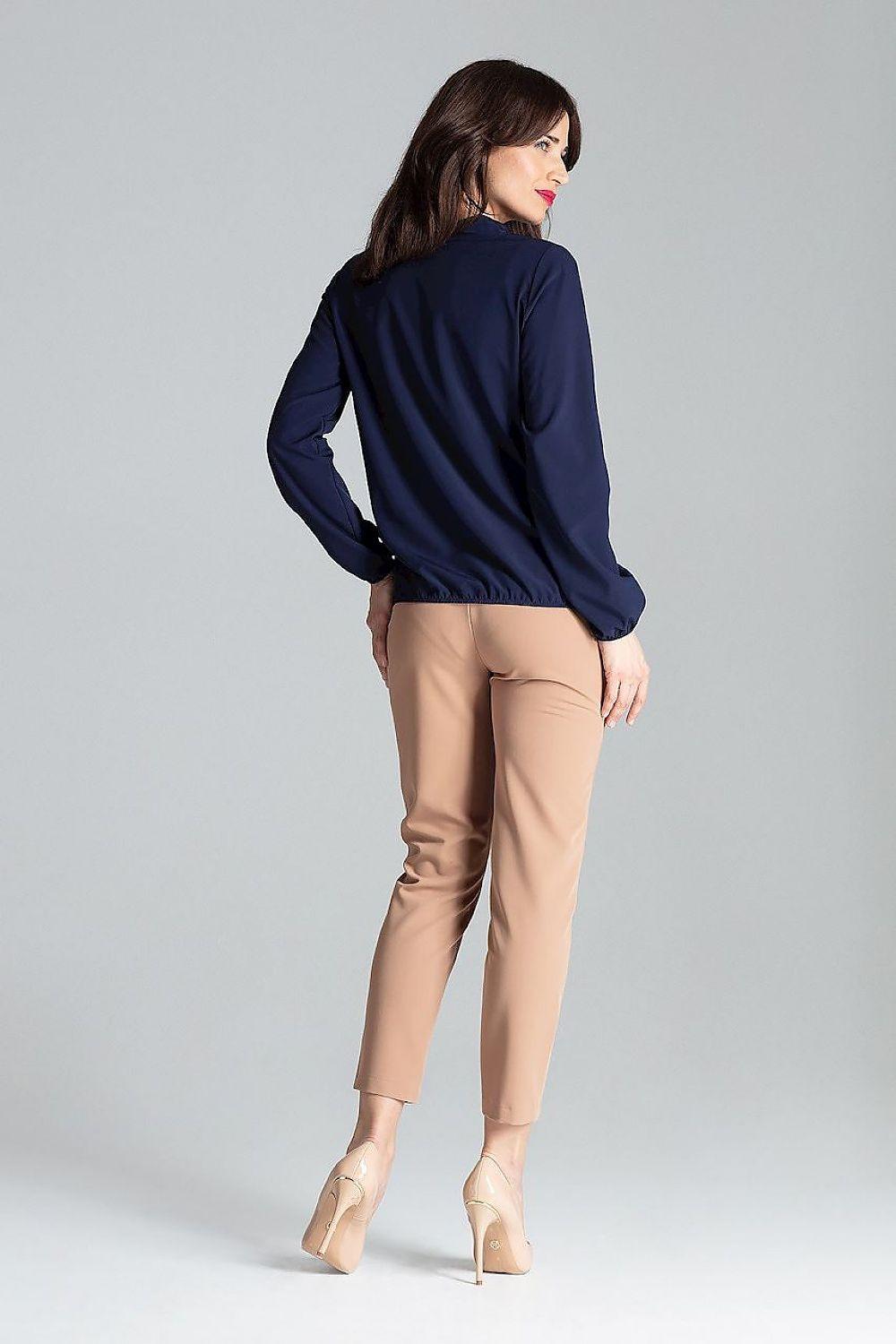 Navy blue blouse with long sleeves and back yoke, side/back view