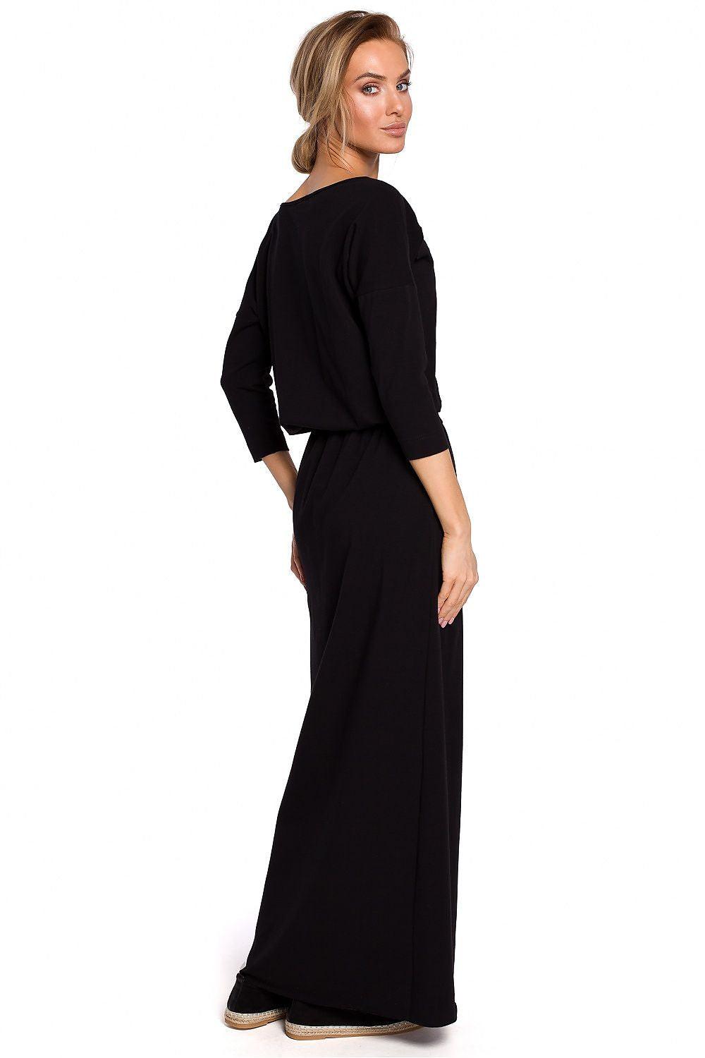 Black long-sleeve off-shoulder maxi dress with gathered waist and tie belt