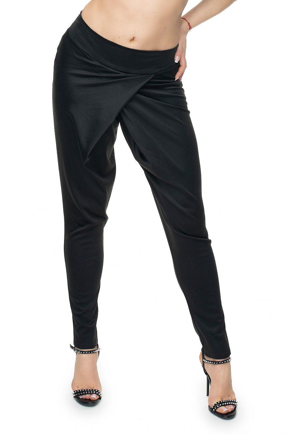 Black overlap-front tapered trousers, draped waistband and fitted cuffs