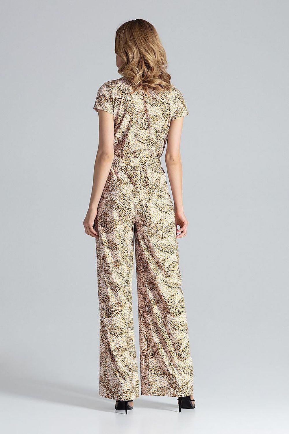 Back view of beige patterned jumpsuit with short sleeves and wide-leg trousers