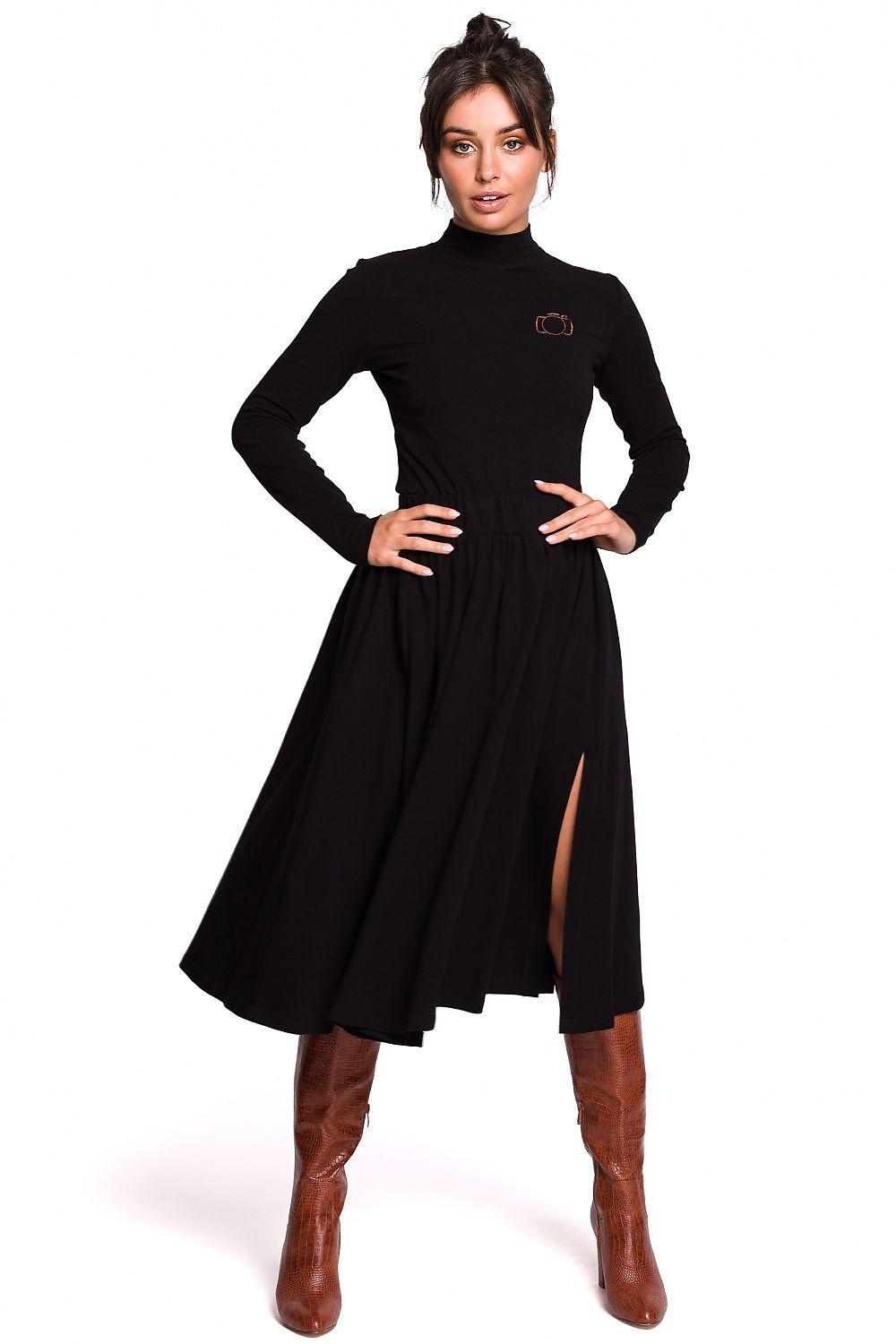 Black flared knit midi skirt with side slit, elastic waistband