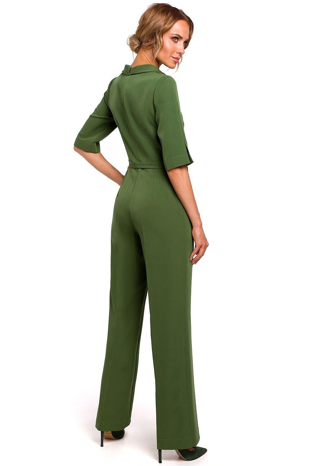 Green women's jumpsuit with half sleeves and wide-leg pants, side view