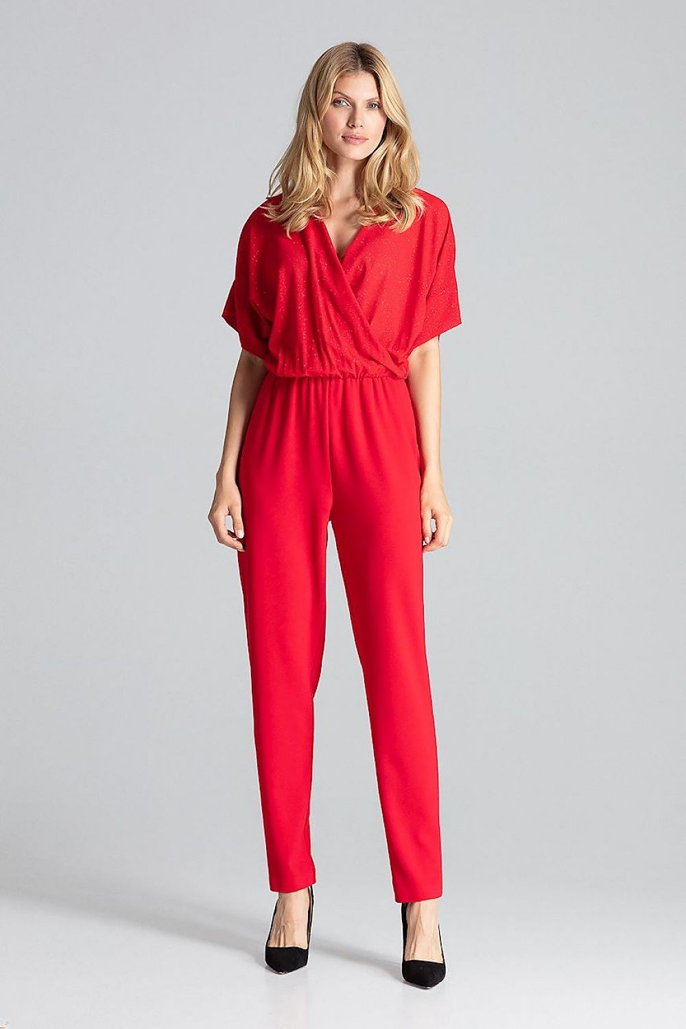 Red jumpsuit with V-neck, short sleeves, belted waist and tapered legs
