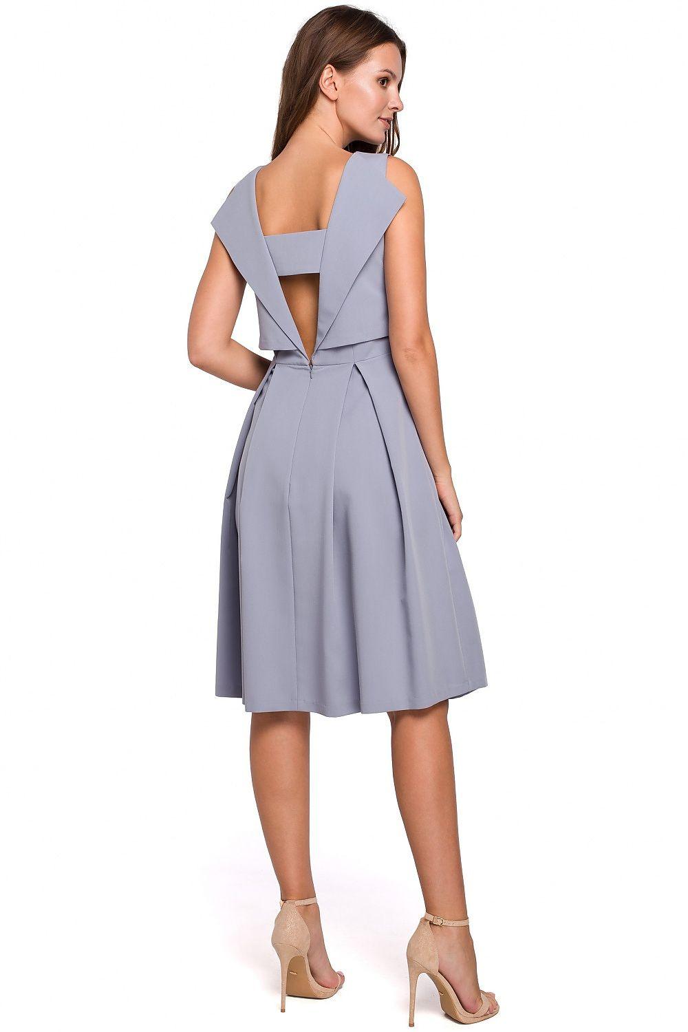 Grey sleeveless evening dress with open back and pleated flared skirt