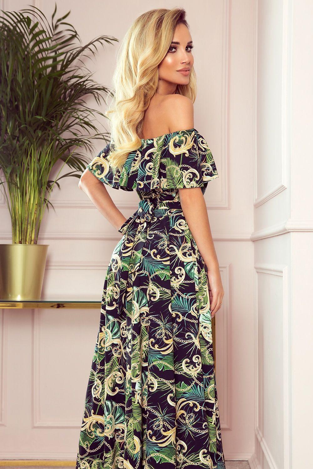 Off-shoulder daydress in dark purple with green and yellow ornate print, side view
