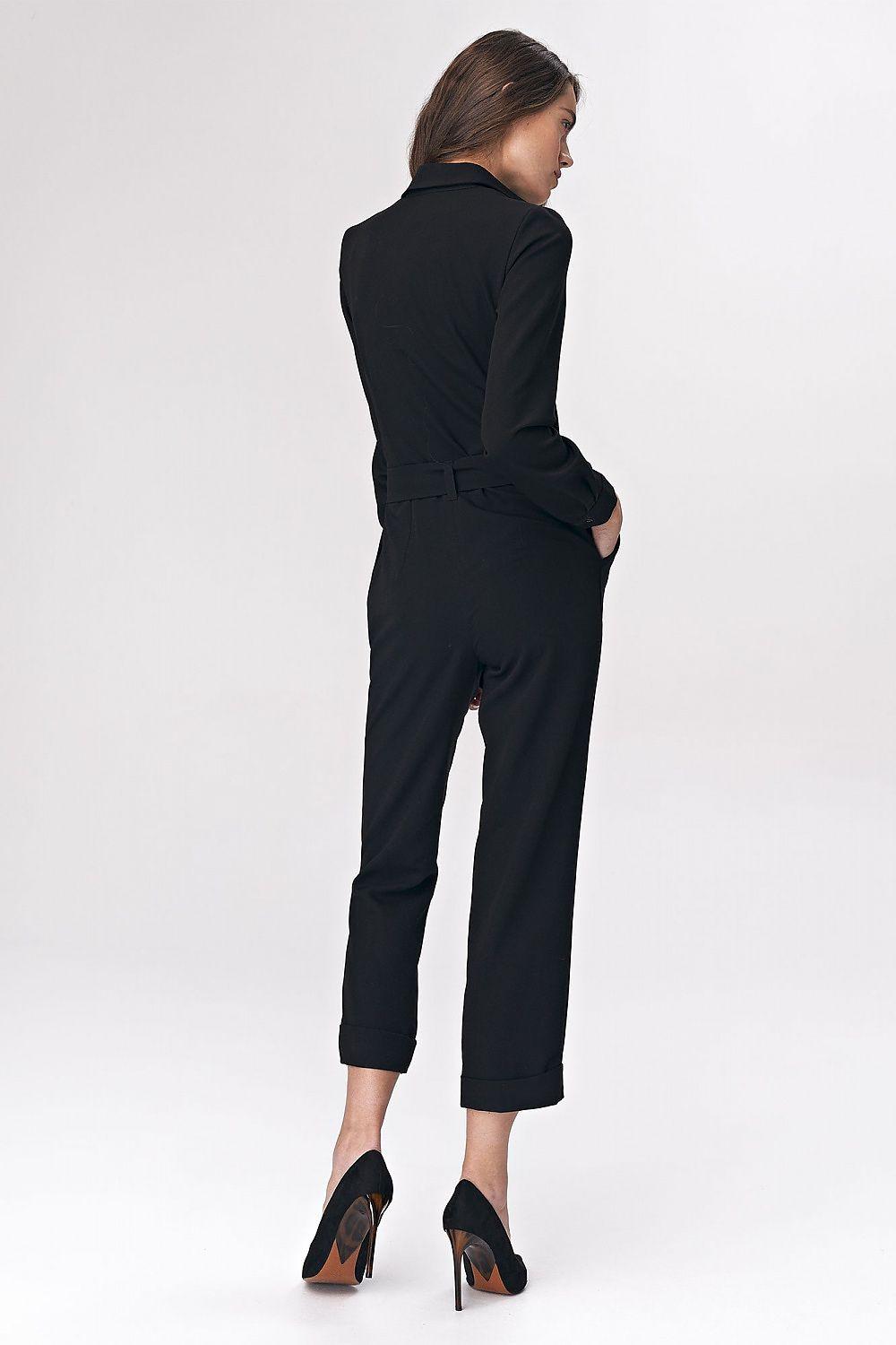 Black belted long-sleeve jumpsuit, back view, cuffed tapered legs