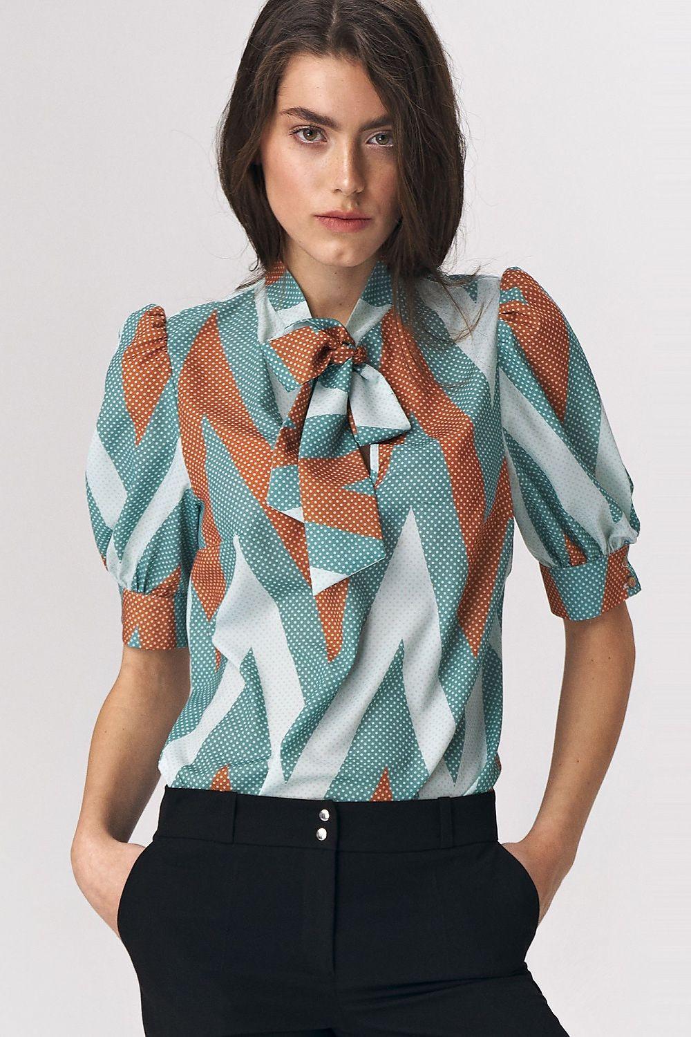 Turquoise zigzag print blouse with neck tie bow and puff sleeves