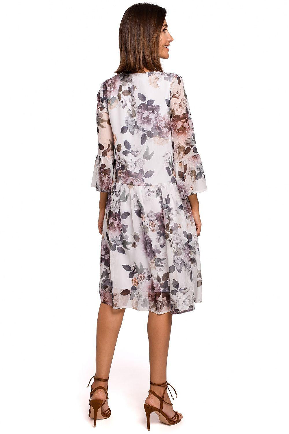 Floral daydress on light base with purple floral print, back view, 3/4 sleeves