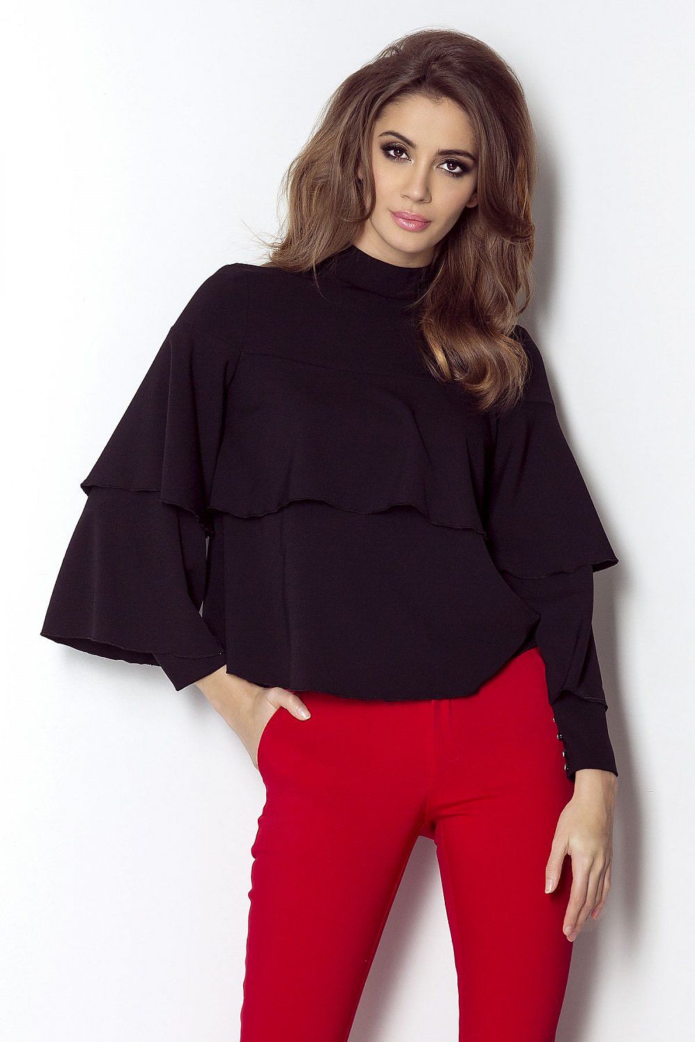 Black ruffled blouse with flared sleeves and partial mock neck