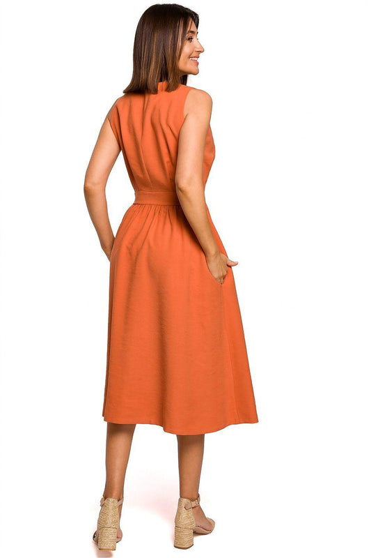 Orange sleeveless V-neck day dress viewed from back, midi length skirt